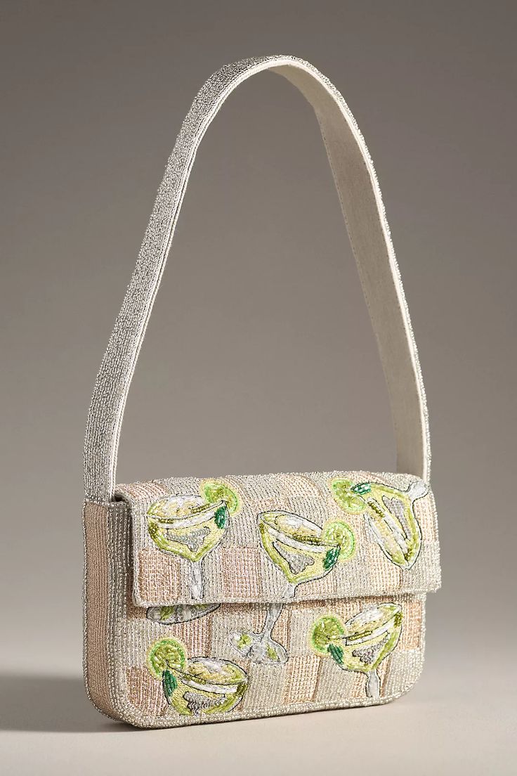ANTHROPROLOGIE CHAMPAGNE BAG