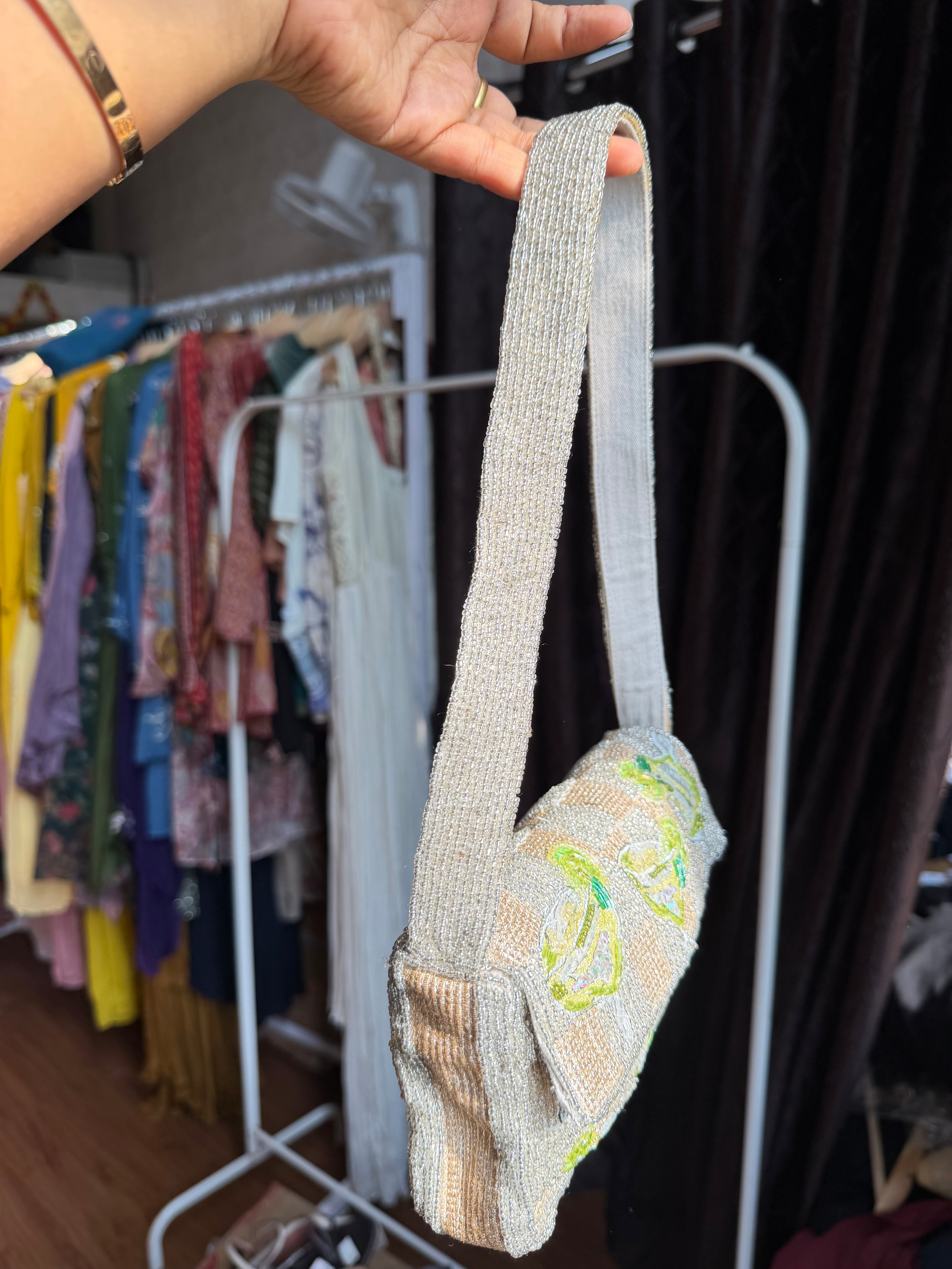 ANTHROPROLOGIE CHAMPAGNE BAG