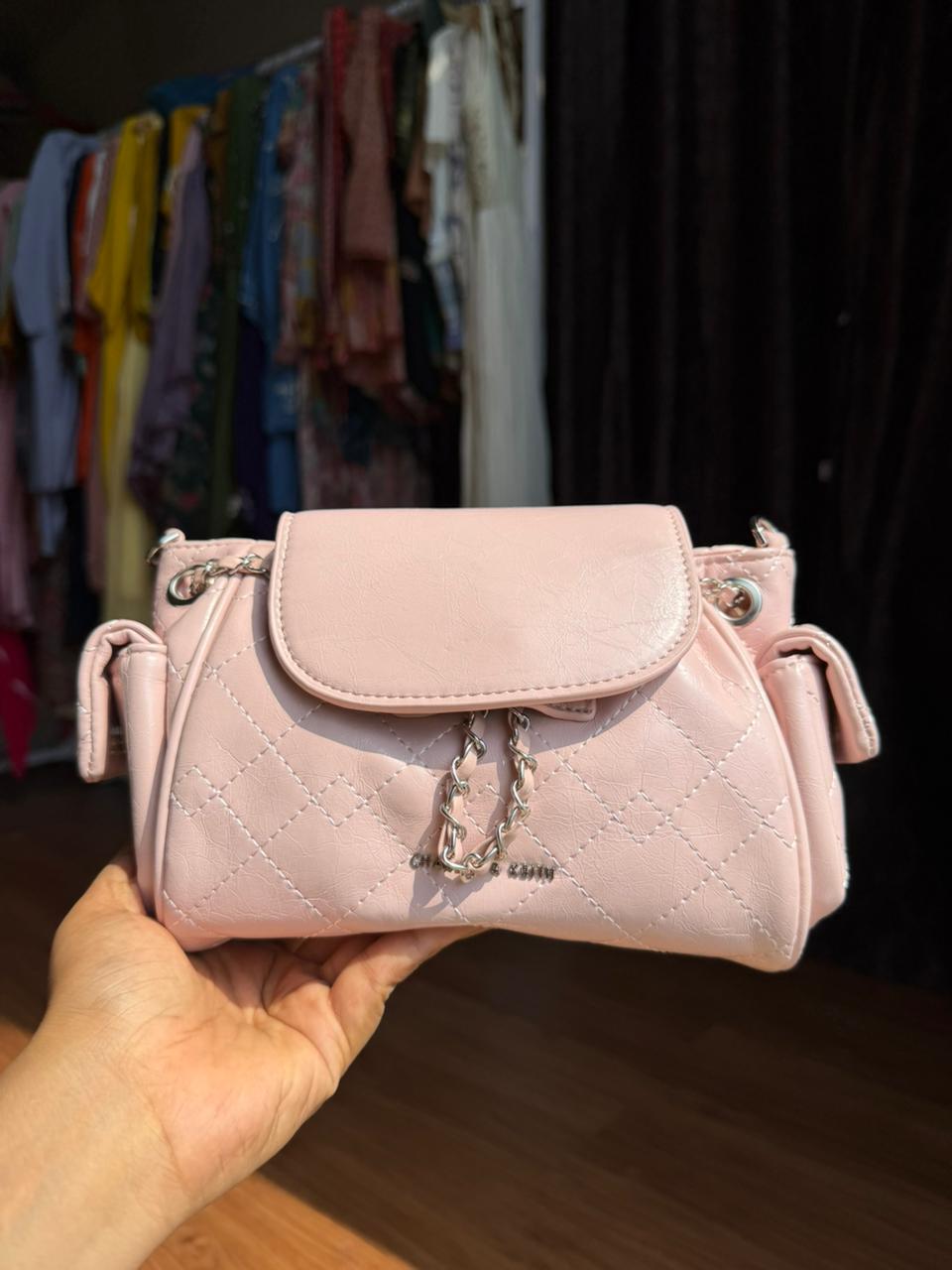 CHARLES AND KEITH -2 In 1 bagpack + crossbody